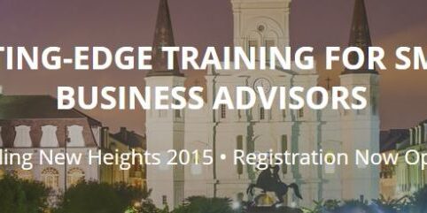 Banner with text: "Cutting-Edge Training for Small Business Advisors. Scaling New Heights 2015 • Registration Now Open," set against a backdrop of a historic building.