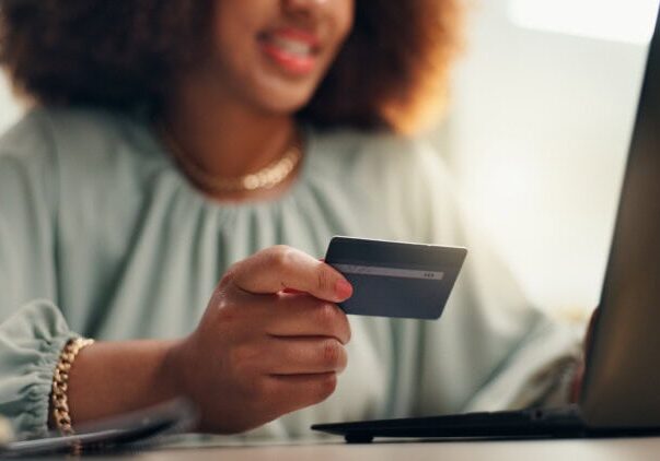 A person holding a corporate card for corporate card reconciliation purposes.