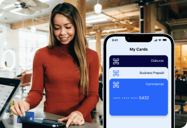 A woman swipes a credit card at a payment terminal; a smartphone screen beside her displays three digital card options.